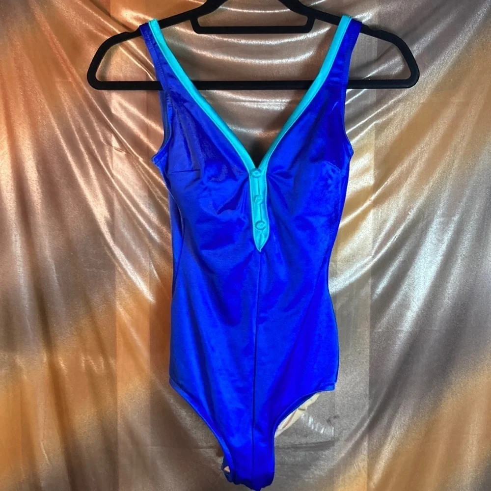VINTAGE 80’ bright blue and turquoise swim suit. High cut 159 32” chest‎ small